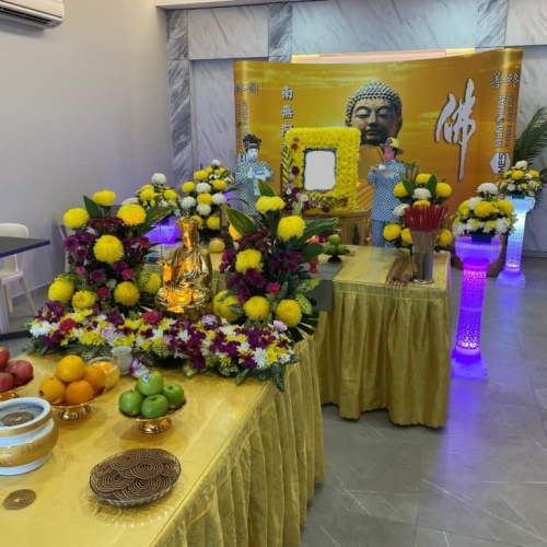 Buddhist Funeral Package - Altar with a gold Buddha backdrop
