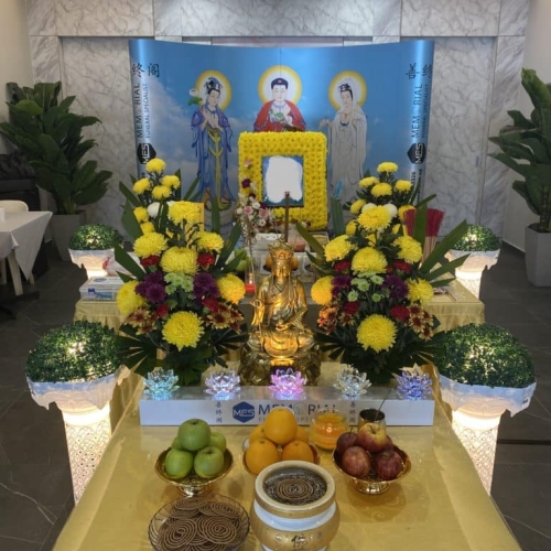 Buddhist Funeral Package - Altar with offering with a Kuan in backdrop