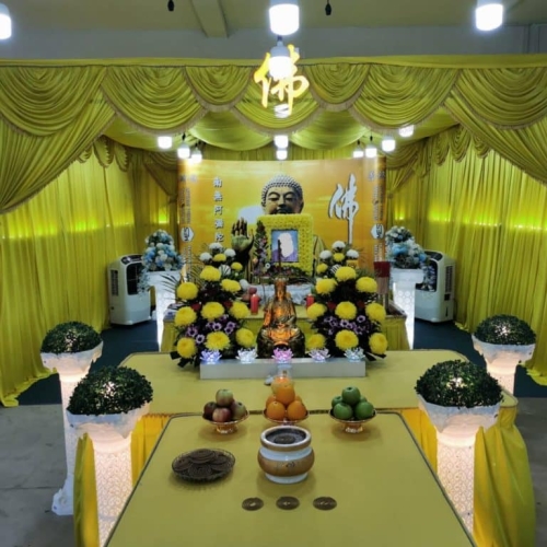 Buddhist Funeral Package - Gold themed Buddhist altar with offerings on the table