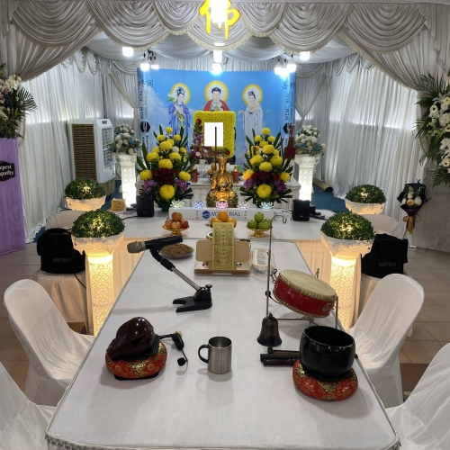 Buddhist Funeral Package with Buddha as backdrop