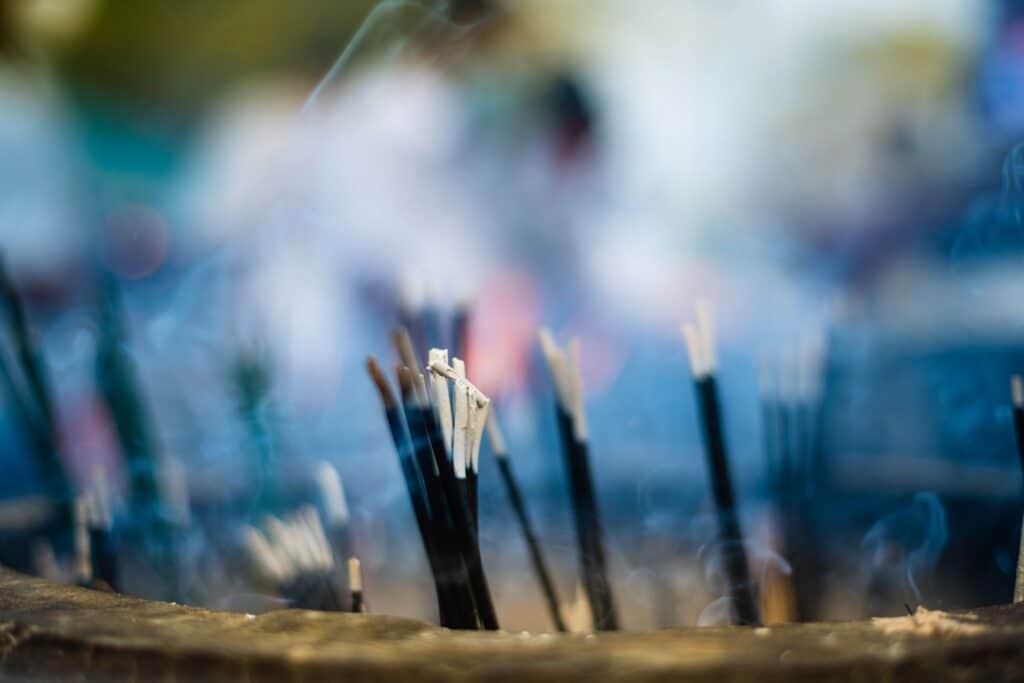 offering incense burning up