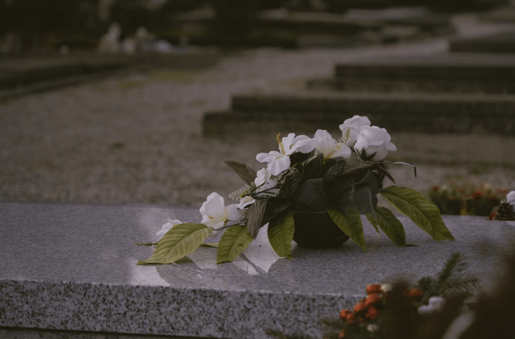 Flowers on  a peaceful grave.